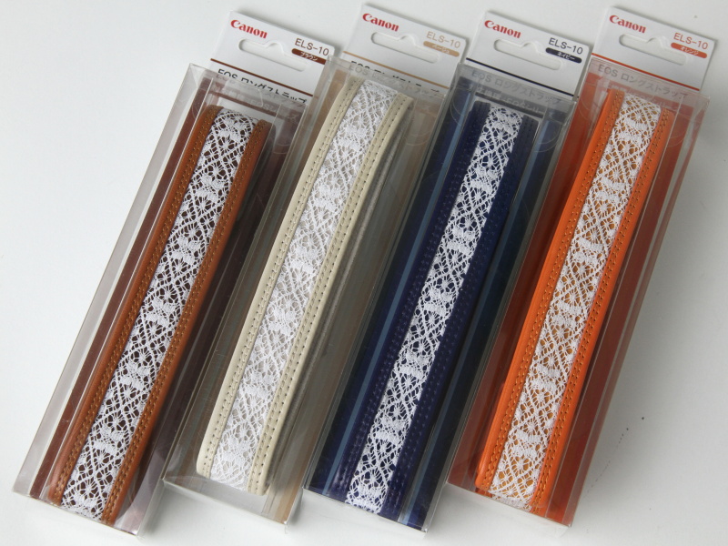 <b>EOSロングストラップ。左からブラウン、ベージュ、ネイビー、オレンジ</b>