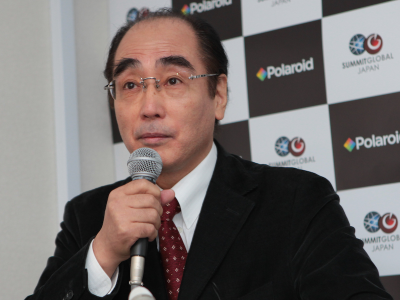 <b>サミット・グローバル・ジャパン取締役の小島佑介氏。オリンパスでデジタルカメラの開発に携わった後、コダック日本法人社長、フレクトロニクス日本法人社長などを歴任した</b>