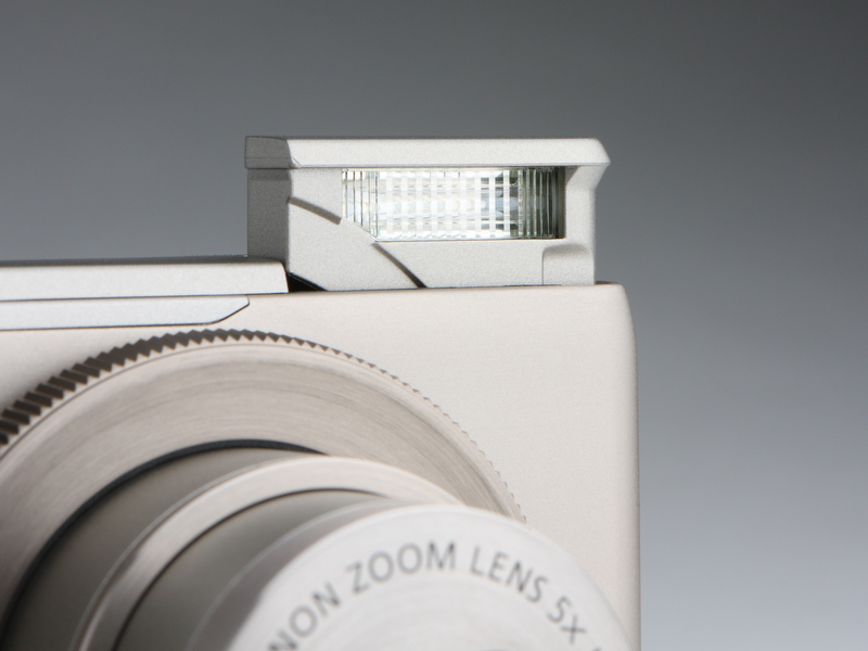 <b>内蔵ストロボは、設定や被写体の明るさに応じて自動的にポップアップする。調光範囲はワイド端で0.5〜7.0m、テレ端で0.5〜2.3mとなる</b>