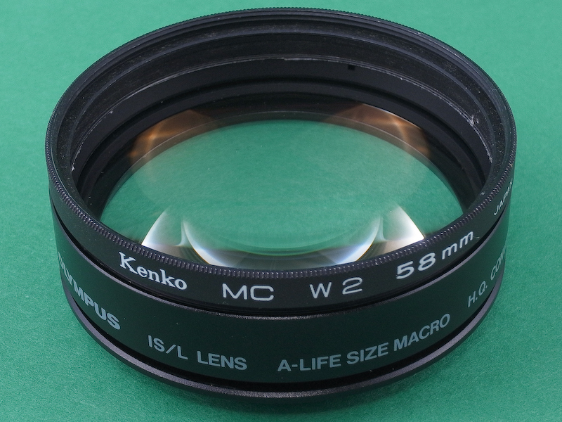 <b>先端に、フィルター枠を装着して完成。これで58mm径のレンズキャップが装着可能になる。</b>