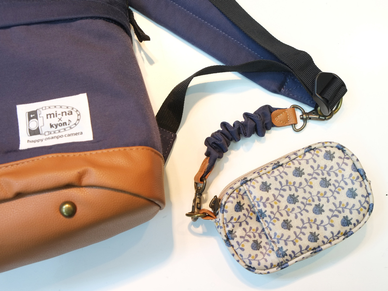 付属のミニポーチは、「ジャバラのゴムが伸びてブラブラするのが気になる」という意見からカラビナに変更。カラビナの取り付け位置を変えることで、用途が広がるようになりました。