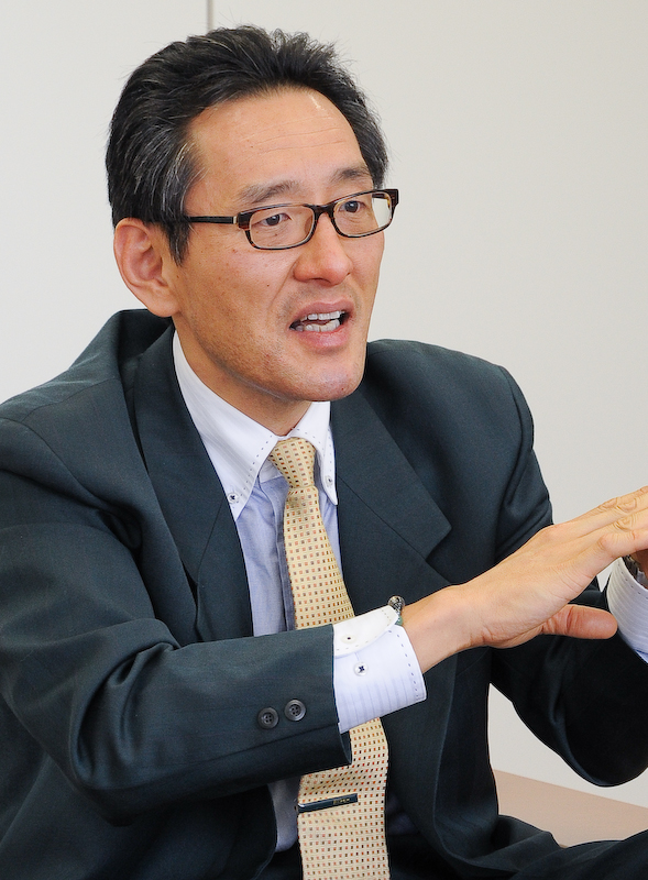 AF-S NIKKOR 58mm F1.4 Gの設計を担当した佐藤治夫氏。