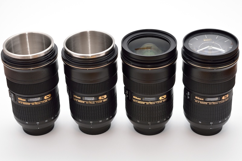 さらにいたずらが高じて、新旧タンブラー、リアレンズキャップLF-1を着けたレンズ、レンズクロックを並べてみた。新旧タンブラーのリアキャップ部はLF-1の形状。レンズクロックのリアキャップ部はLF-4型（スピーカーが仕込んであるので着脱は不可）。