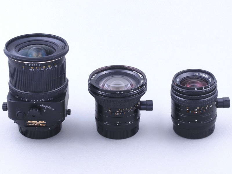 今回はご覧の3本の、ニコンの広角系アオリレンズを比較することにした。左のPC-E NIKKOR 24mm F3.5 D EDは2008年2月発売の現行品（最大径82.5×全長108mm、重量730g）。真ん中のPC-Nikkor 28mm F3.5は1981年2月発売（最大径78×全長64.5 mm、重量380g）、右のPC-Nikkor 35mm F2.8<new class="">は1980年11月発売（最大径62×全長61.5mm、重量330g）で、ともに販売終了の旧製品。比較するとPC-E NIKKOR 24mm F3.5 D EDが飛び抜けて大きいのがわかる。</new>