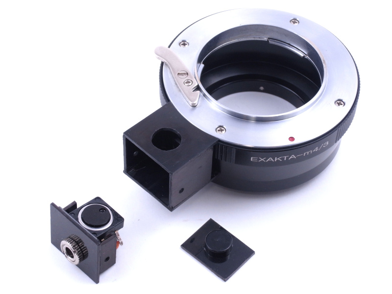 ユニット化した各パーツを並べてみたところ。シャッターボタンを組み込み、蓋をネジ止めすれば完成だ。今回はメンテナンスや改良工作がしやすいよう、できるだけシンプルな構造を考えてみた。