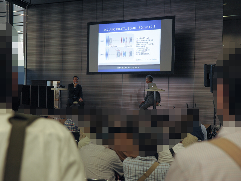写真家によるセミナーも立ち見ができるほどの人気。斎藤巧一郎氏が新レンズについて解説していた