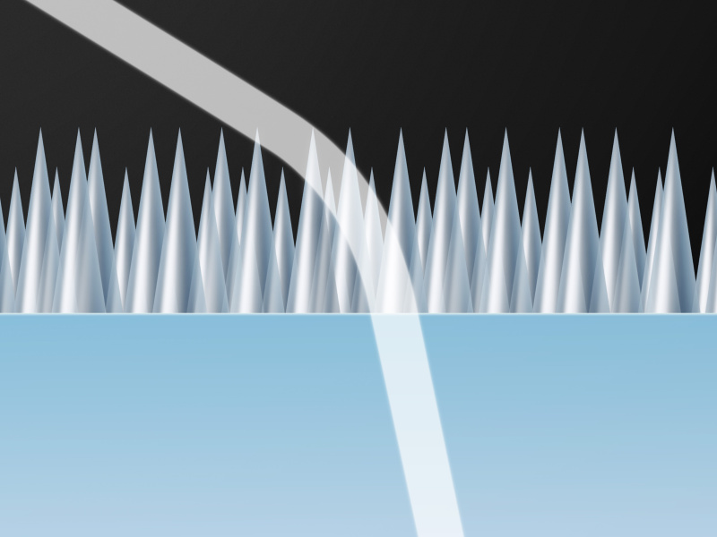 <strong class="">くさび状の構造が特徴のSWC</strong><br class="">レンズの表面にナノサイズのくさび状の構造物を施すことで、徐々に屈折率を変化させ、単独で反射を抑えるのがSWCだ。EF100-400mm F4.5-5.6L IS II USMには採用されていない