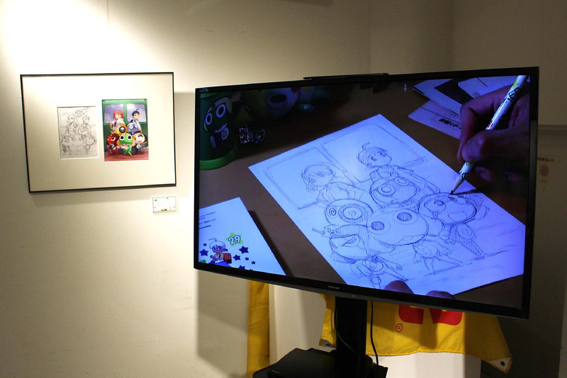 このイベントのために吉崎氏が描き下ろしたイラストは、メイキング映像とともに展示