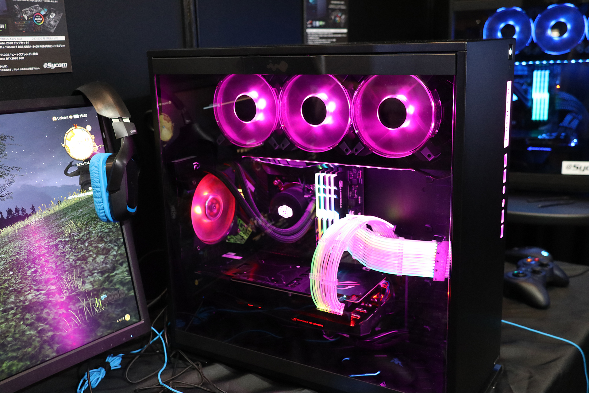 @Sycomブースには4月に発売を予定している「FFXIV」推奨PCを展示していた。ケーブルとファンが七色に光エンスージアスト向けのハイエンドPCだ