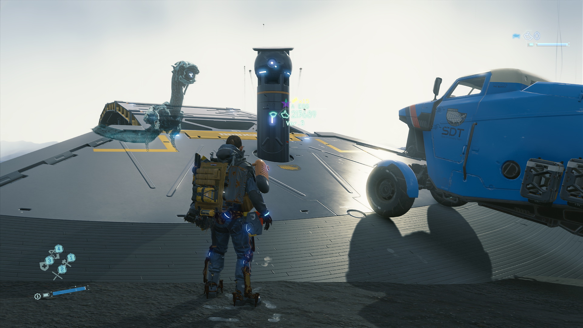 「中」設定。ホログラムの影が消える。トラックの左前輪タイヤカバーからも光が消える