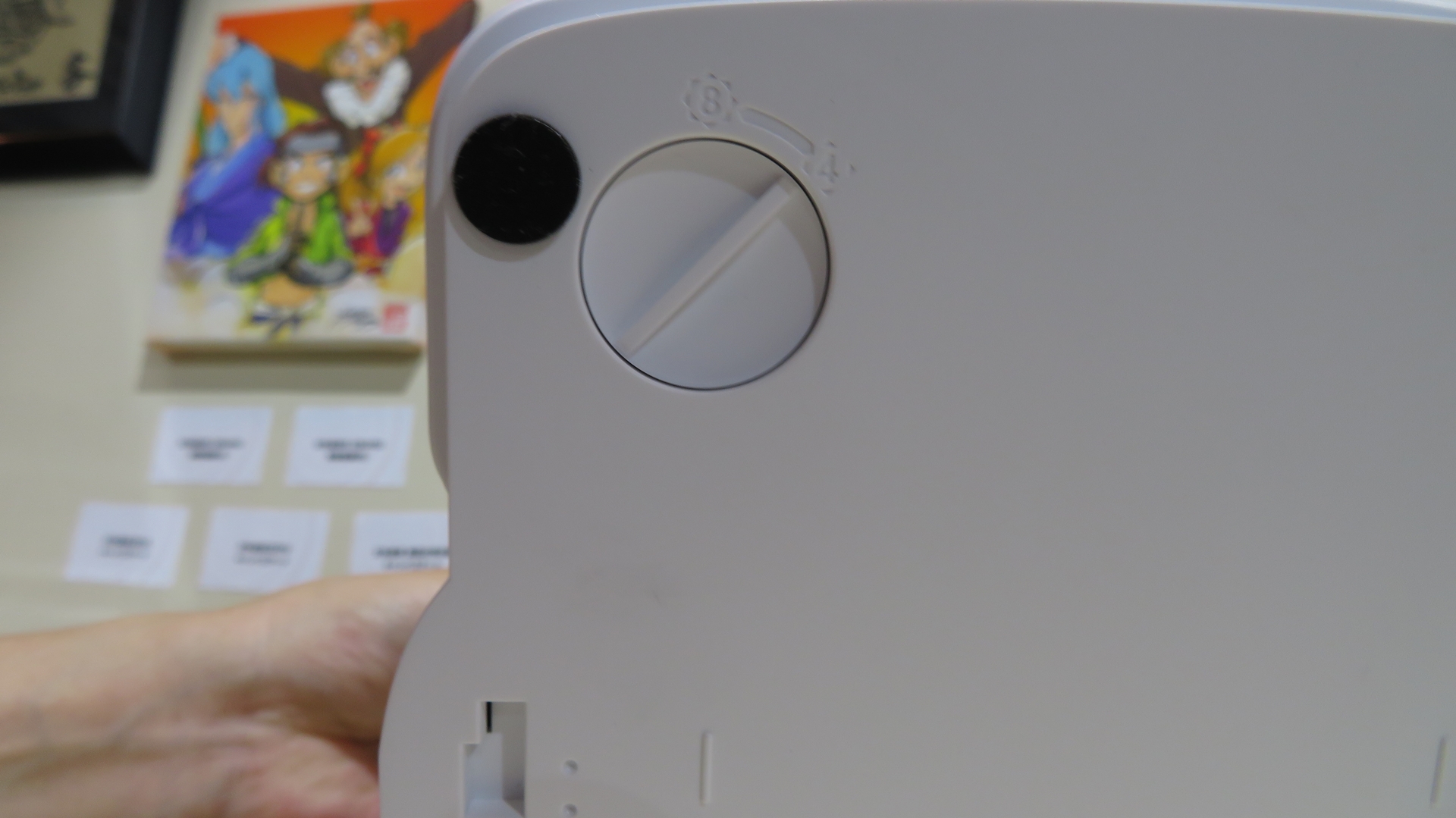 本体下部に、レバーの8、4方向を切り替えるスイッチが付いている