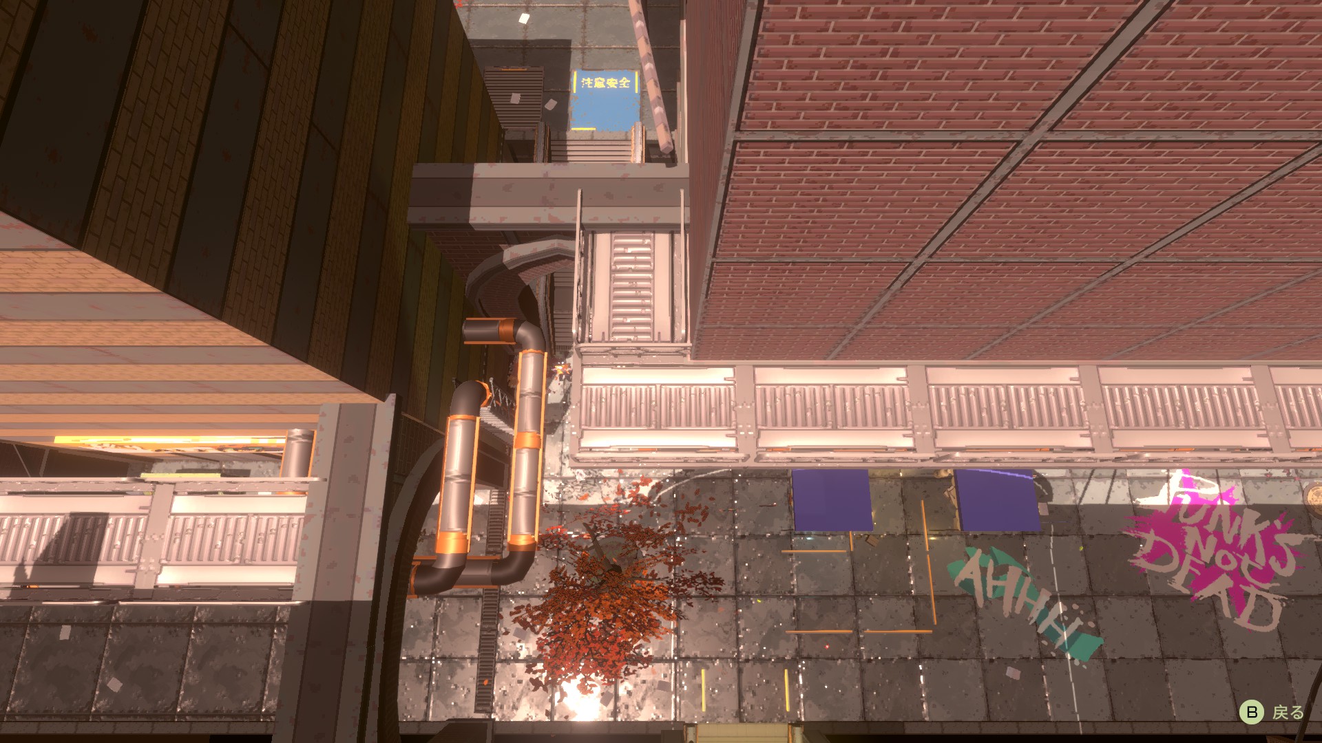 吹き抜けから下をを見た視点。路地裏の落書きなどが確認できる