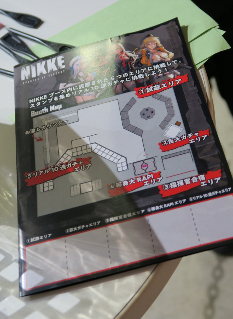 こちらはNIKKEブースでもらえるスタンプカード。すべてのエリアに挑戦すると最後にNIKKEの文字が集まる