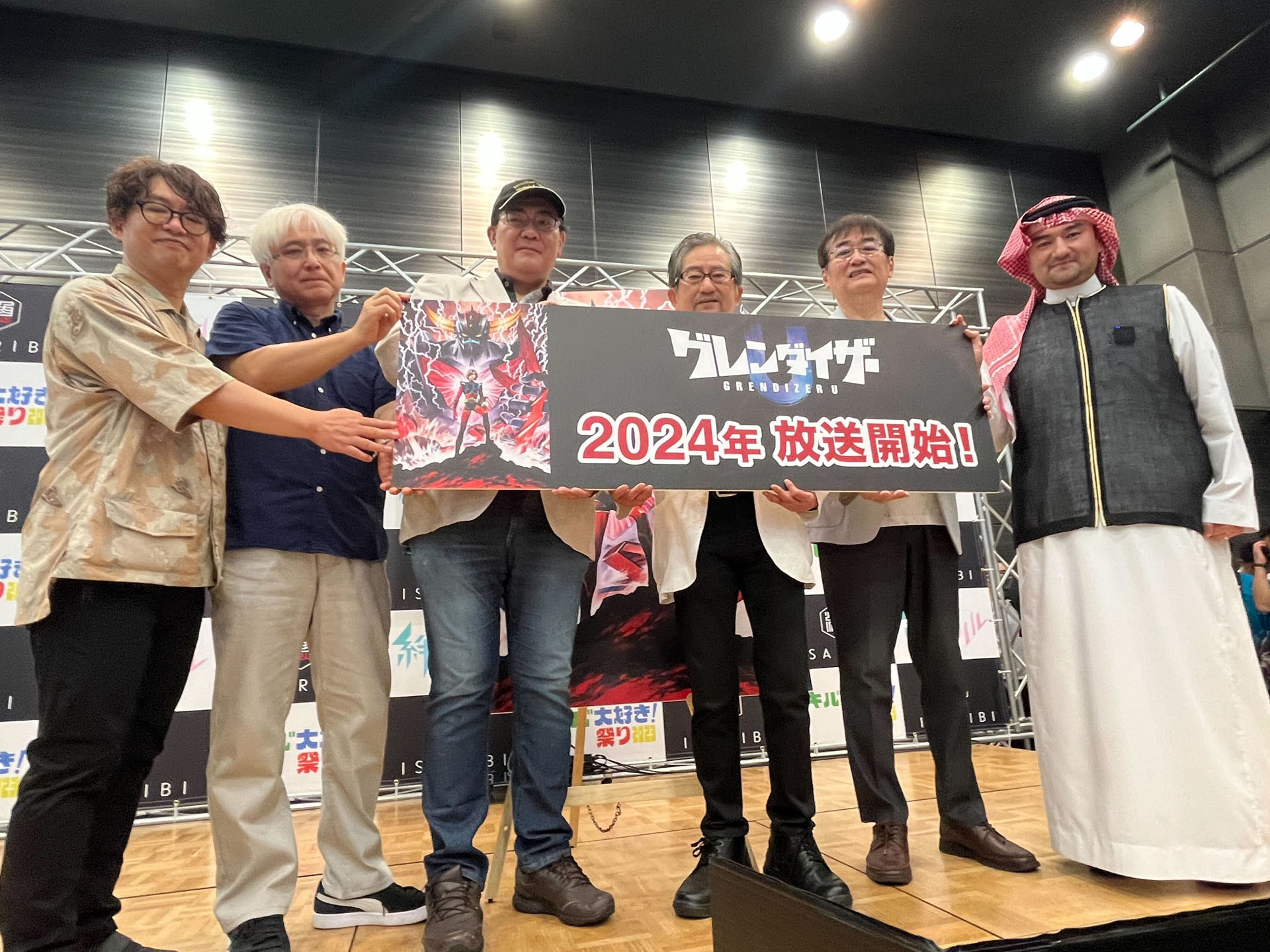 イベントでタイトル披露が行われた。左から大河内一楼氏、貞本義行氏、福田己津央氏、永井豪氏、田中公平氏、ブカーリ・イサム氏