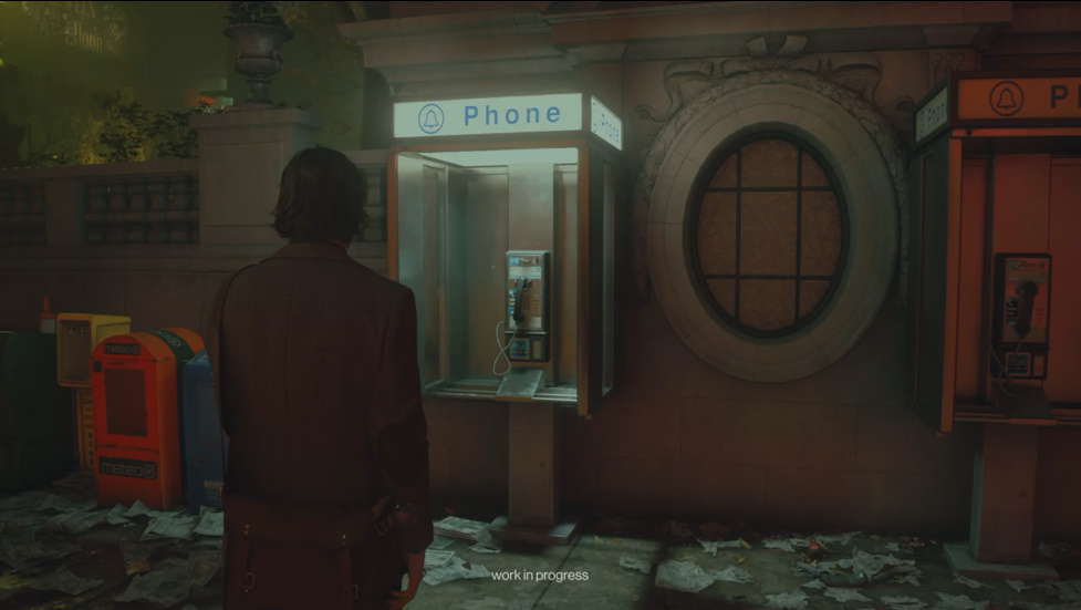 アランを待っていたかのように公衆電話が鳴り始める