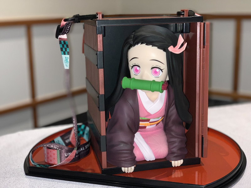 禰豆子のポップコーンバケツも再登場。今回はストラップの柄に少し変化がついたらしい