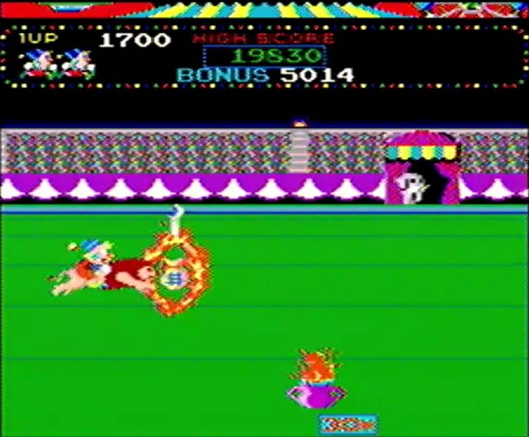 「火の輪くぐり」ステージより。高得点のドル袋がある小さな火の輪は無視しても先に進めるが、くぐる際はジャンプの軌道を少しでも間違えると即ミスとなる