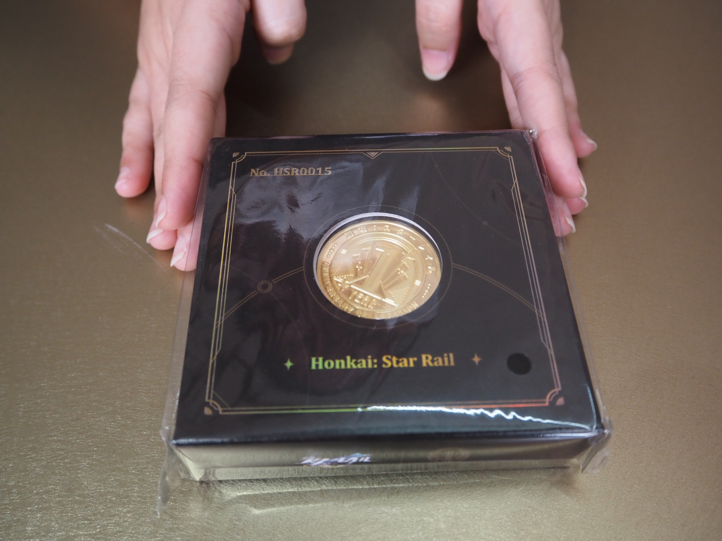 全てのスタンプを埋めた上で物販エリアで商品を購入するともらえる目玉の「周年記念コイン」