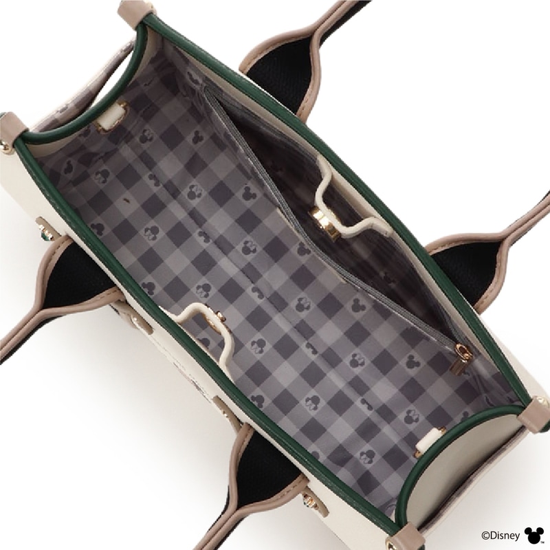 裏地には「ミッキーマウス」と「ミニーマウス」のシルエットとギンガムチェック柄がデザインされている