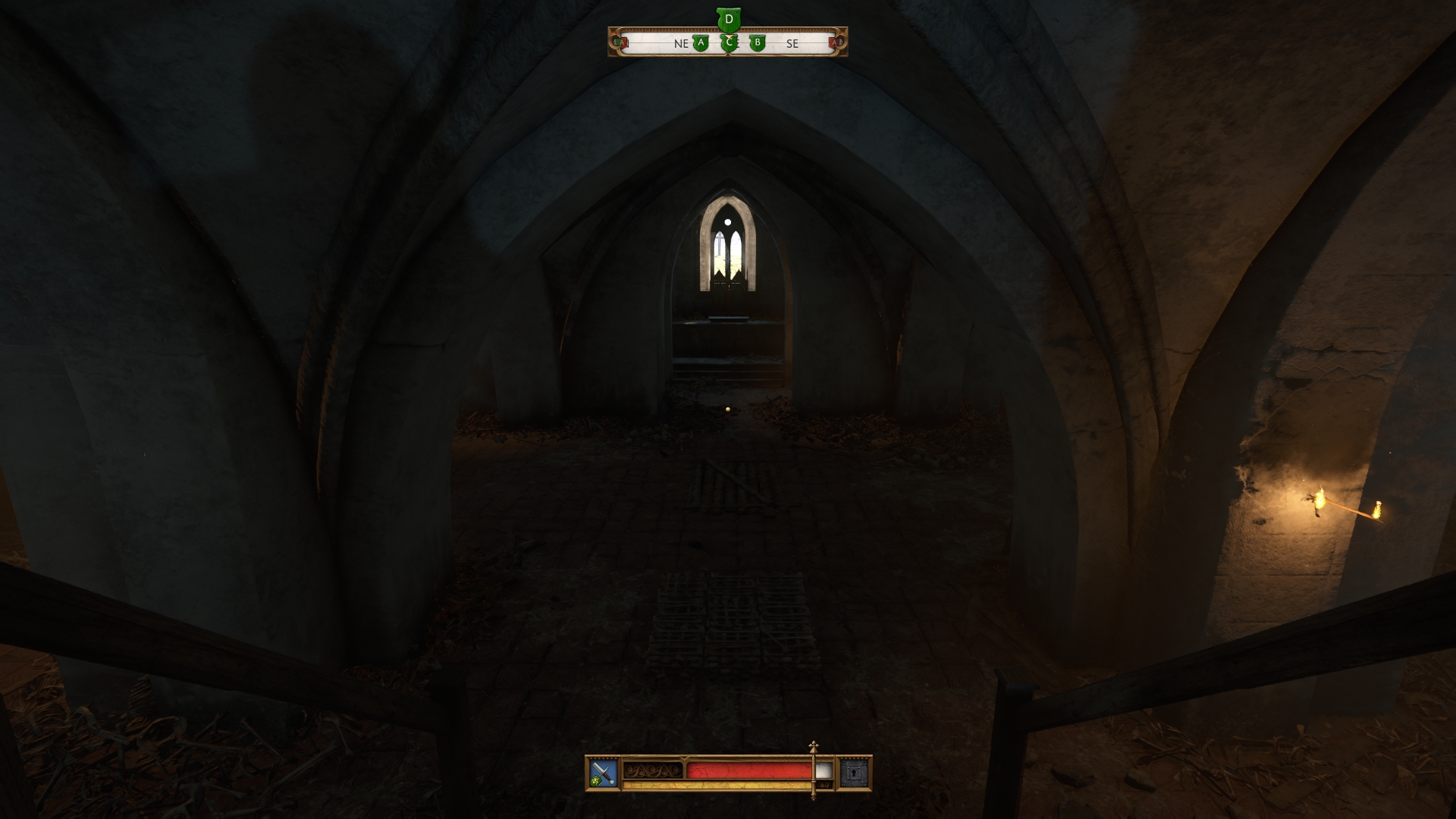 「KCD2」では内部は暗く、骨が散乱している