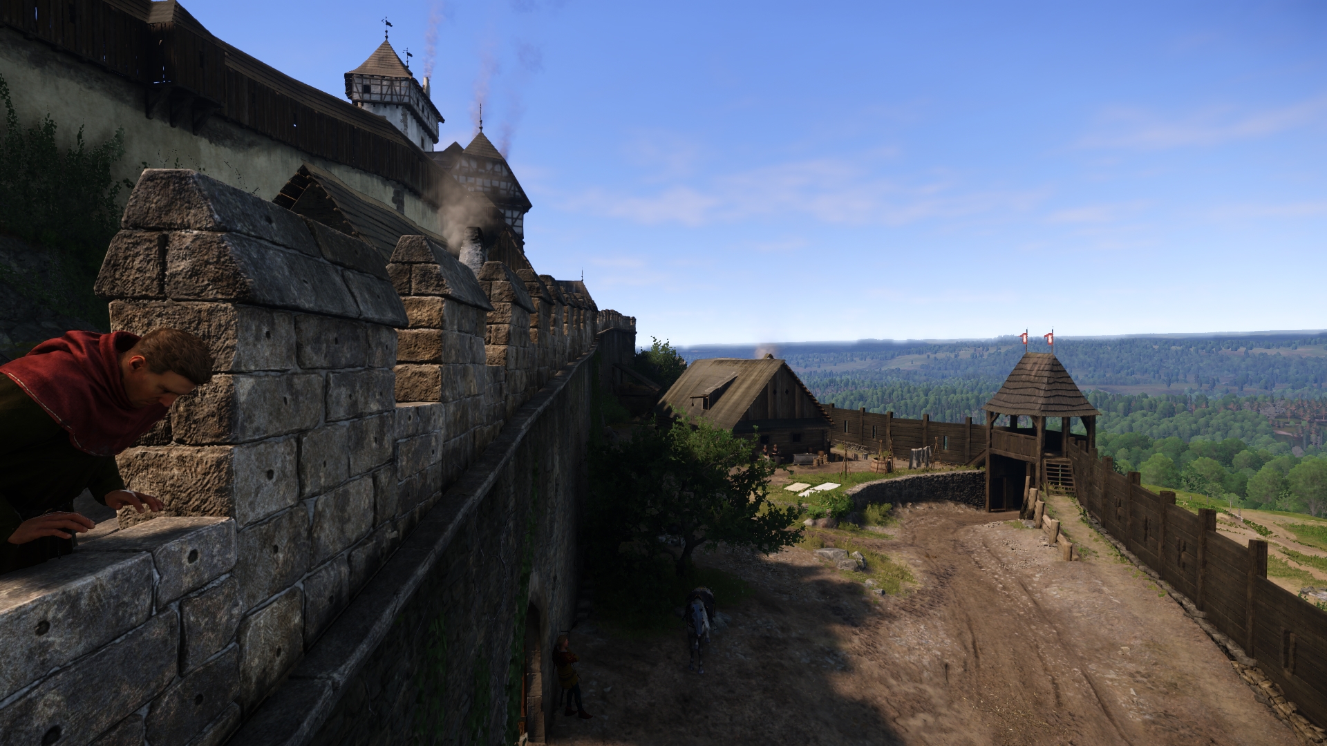 「KCD2」では、城壁のさらに外側に木造の柵が設置されている
