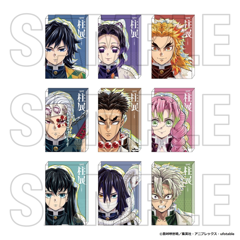 柱展キービジュアルの完成画と原画を重ねたデザインのアクリルブロック