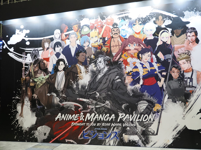 ブースの壁面に描かれた巨大アートボード。フォトスポットのようになっていた