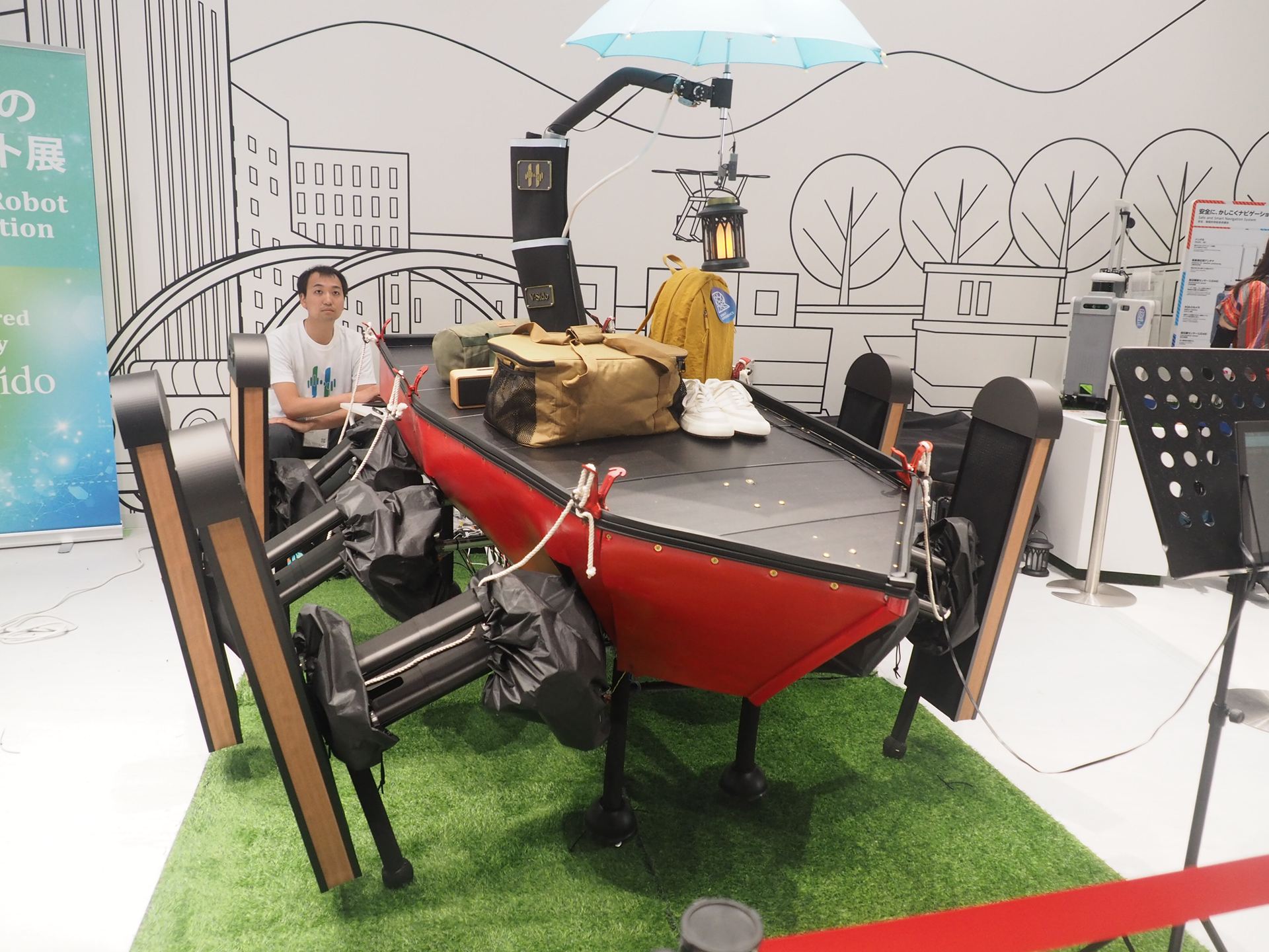 IPA（独立行政法人情報処理推進機構）の未踏アドバンスト事業において「大型六脚ロボットによる適応的行動獲得システムの開発」プロジェクトとして採択された「ハルモニア・コンパス」