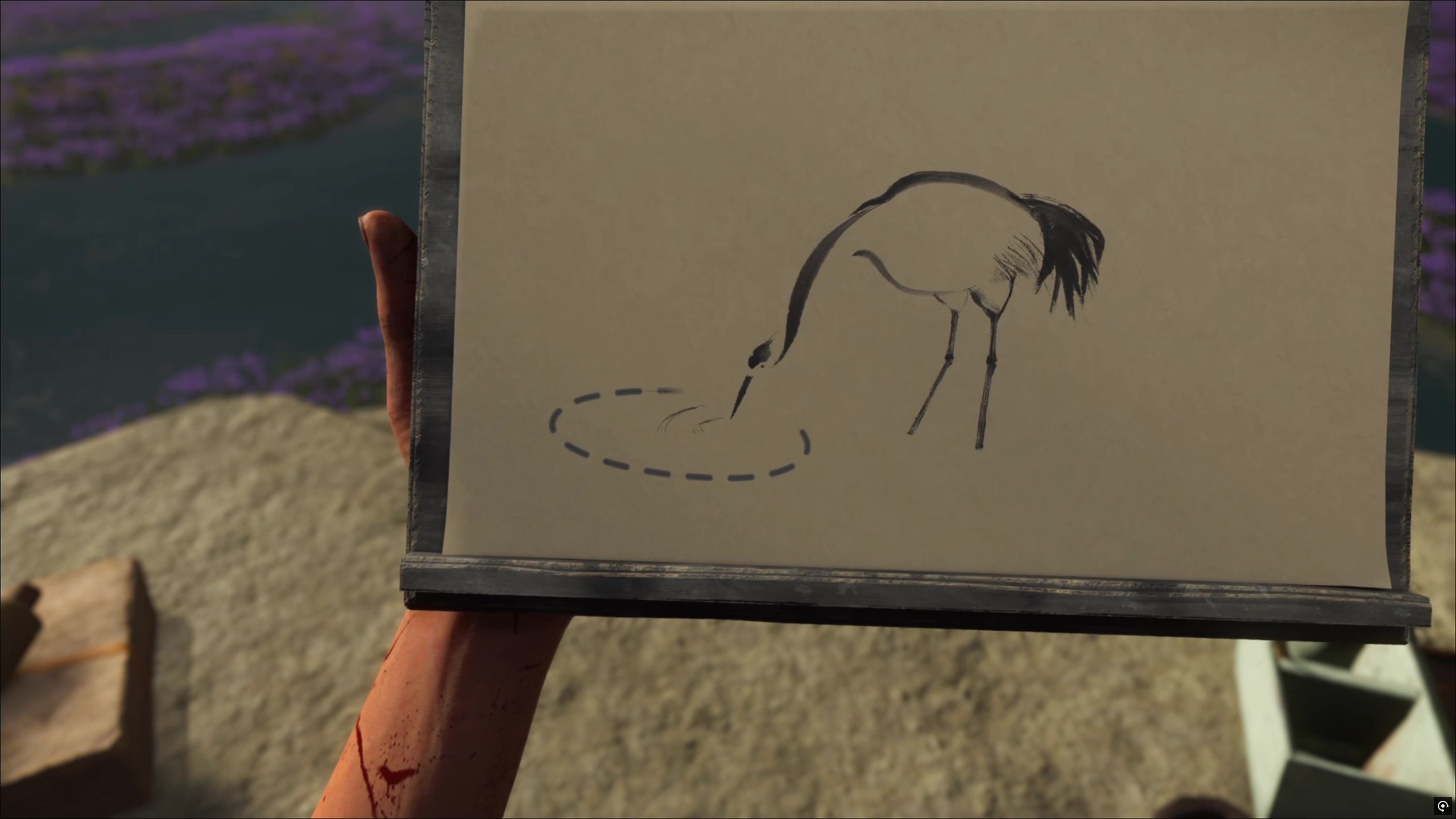 タッチパッドの上で点線をなぞり、墨絵を仕上げていく