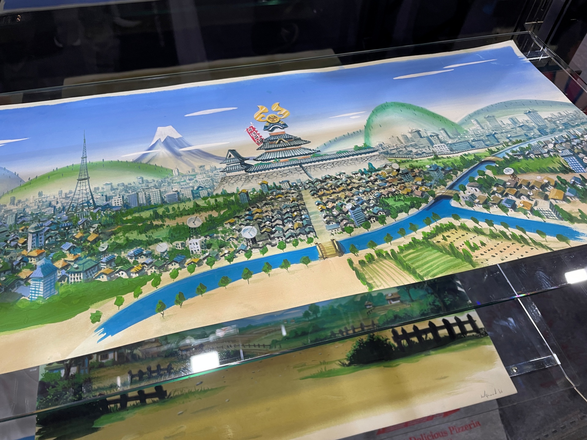 展示されている背景画。鈴木典孝氏がゲームのために描いた、ある意味オリジナル版