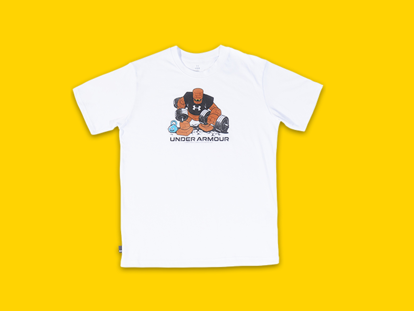 Under Armour「UAヘビーウェイト ショートスリーブTシャツ <ダンベルゴーレム>」価格：5,940円