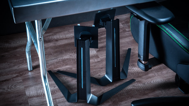 使用されることなく、デスク下に保管されたスタンドのイメージ。「GRAPHT」はスタンドを不要とする声に着目し「スタンドレスモデル」を提案