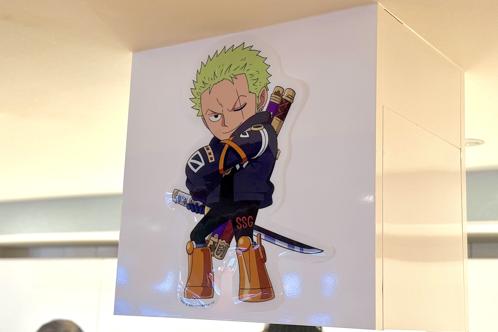 コラボ第1弾のメニュー表。ルフィたちがメニューを手に持った描き下ろしイラストが使用されている