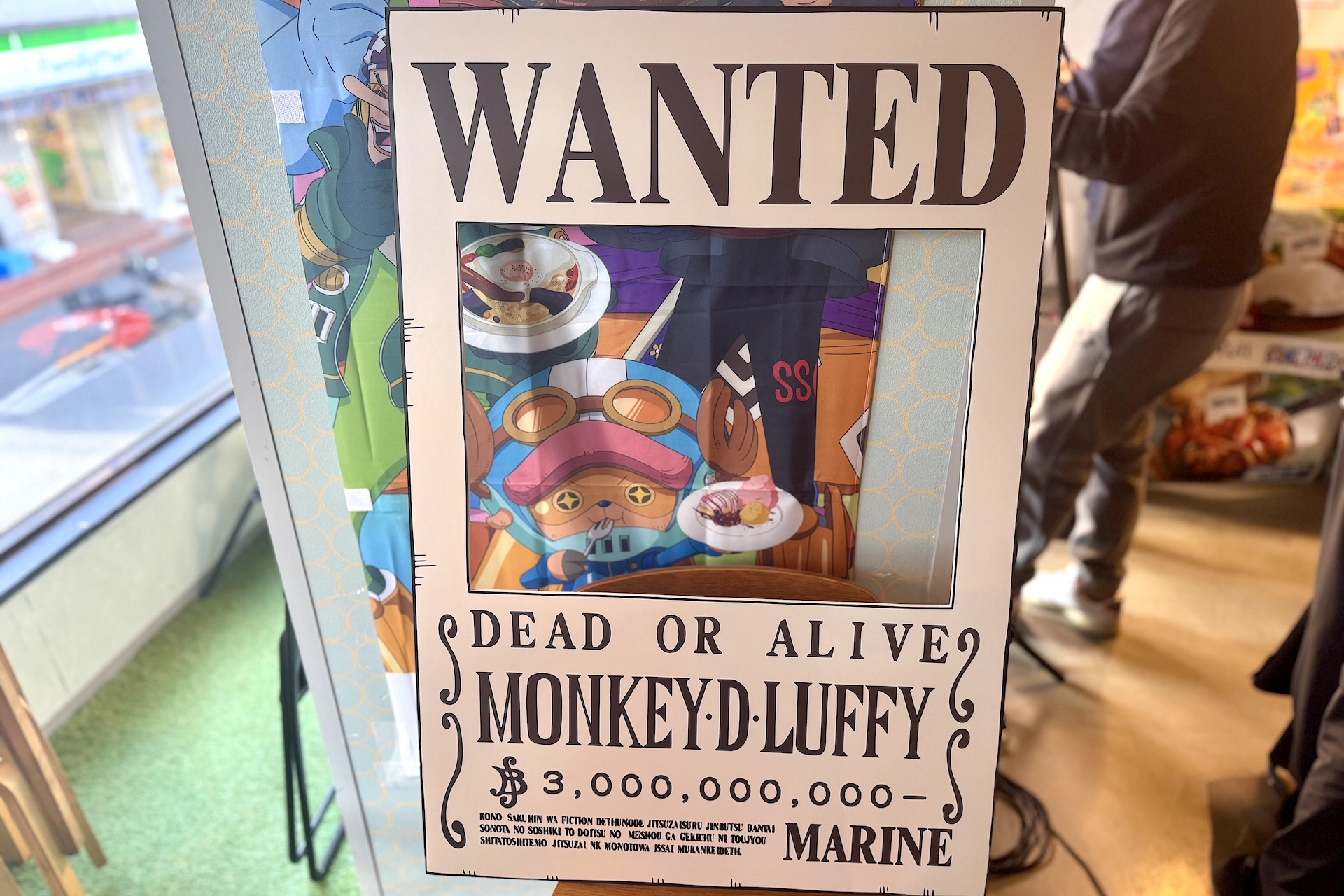 コラボ第1弾のメニュー表。ルフィたちがメニューを手に持った描き下ろしイラストが使用されている