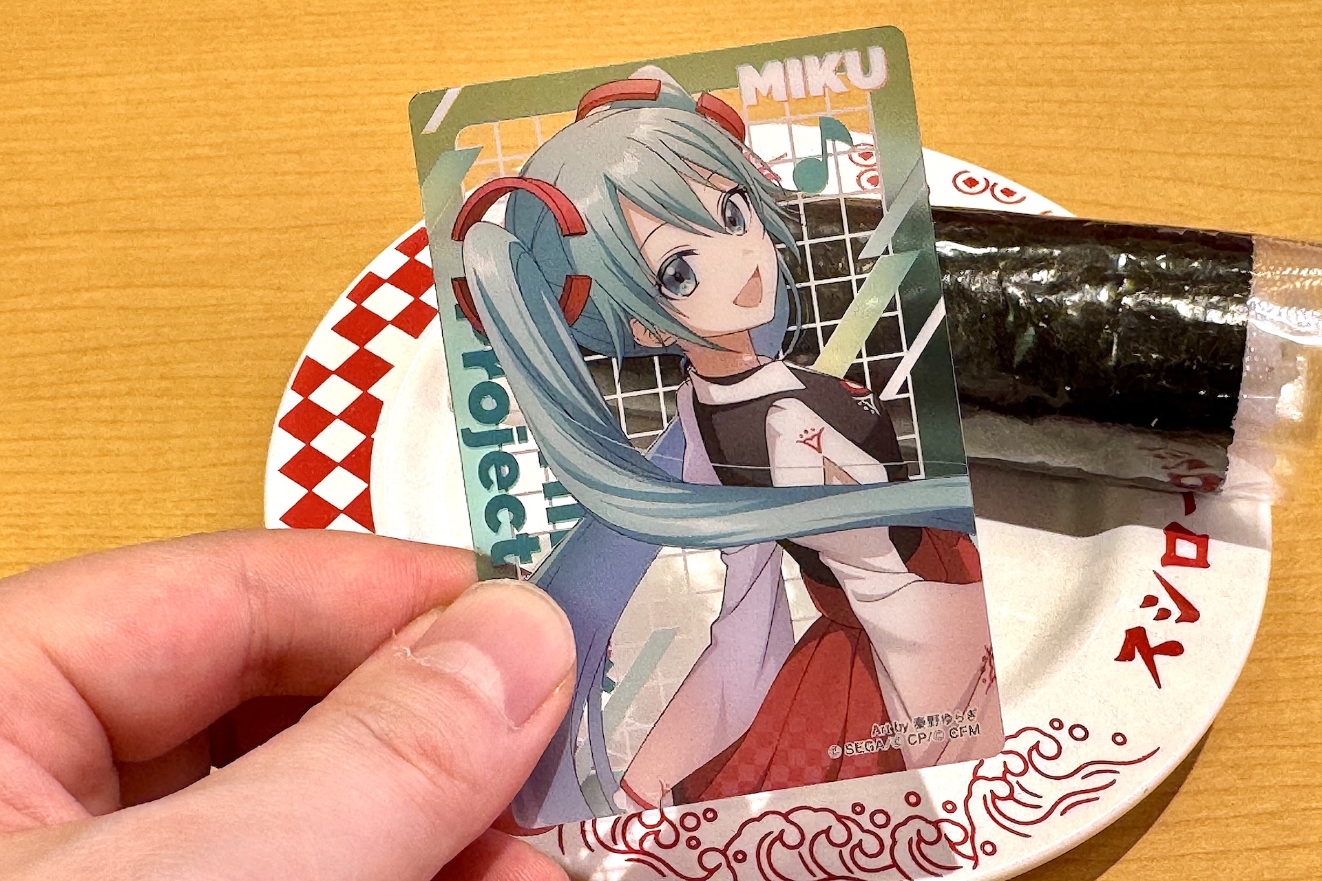 内容はプラカード1枚と、キャンペーンに応募できる二次元コードが入っている