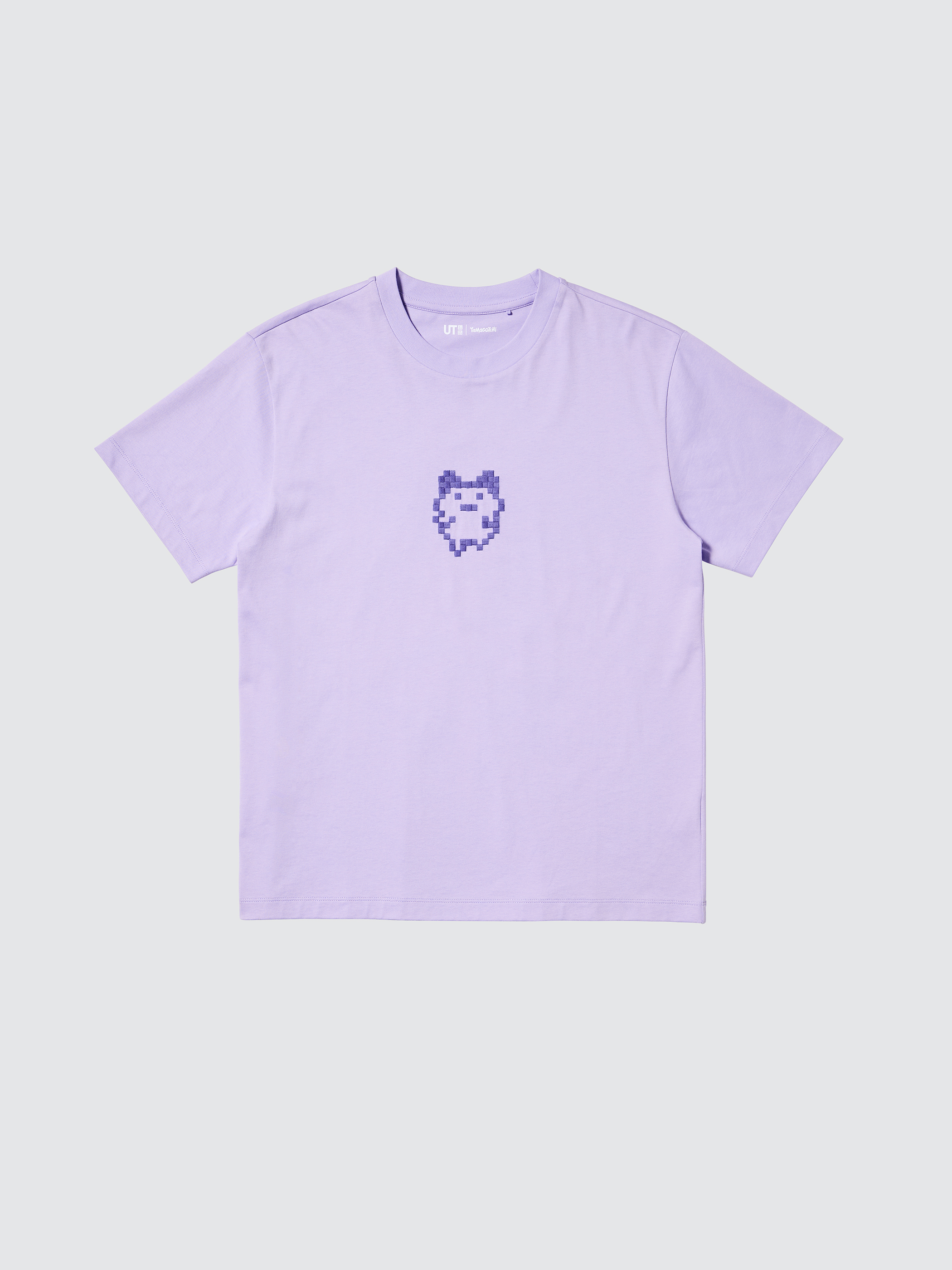 たまごっちをマメに育てた人しか出会えない「まめっち」を刺繍で表現。バックには、たまごっちならではのシーンがプリントされている