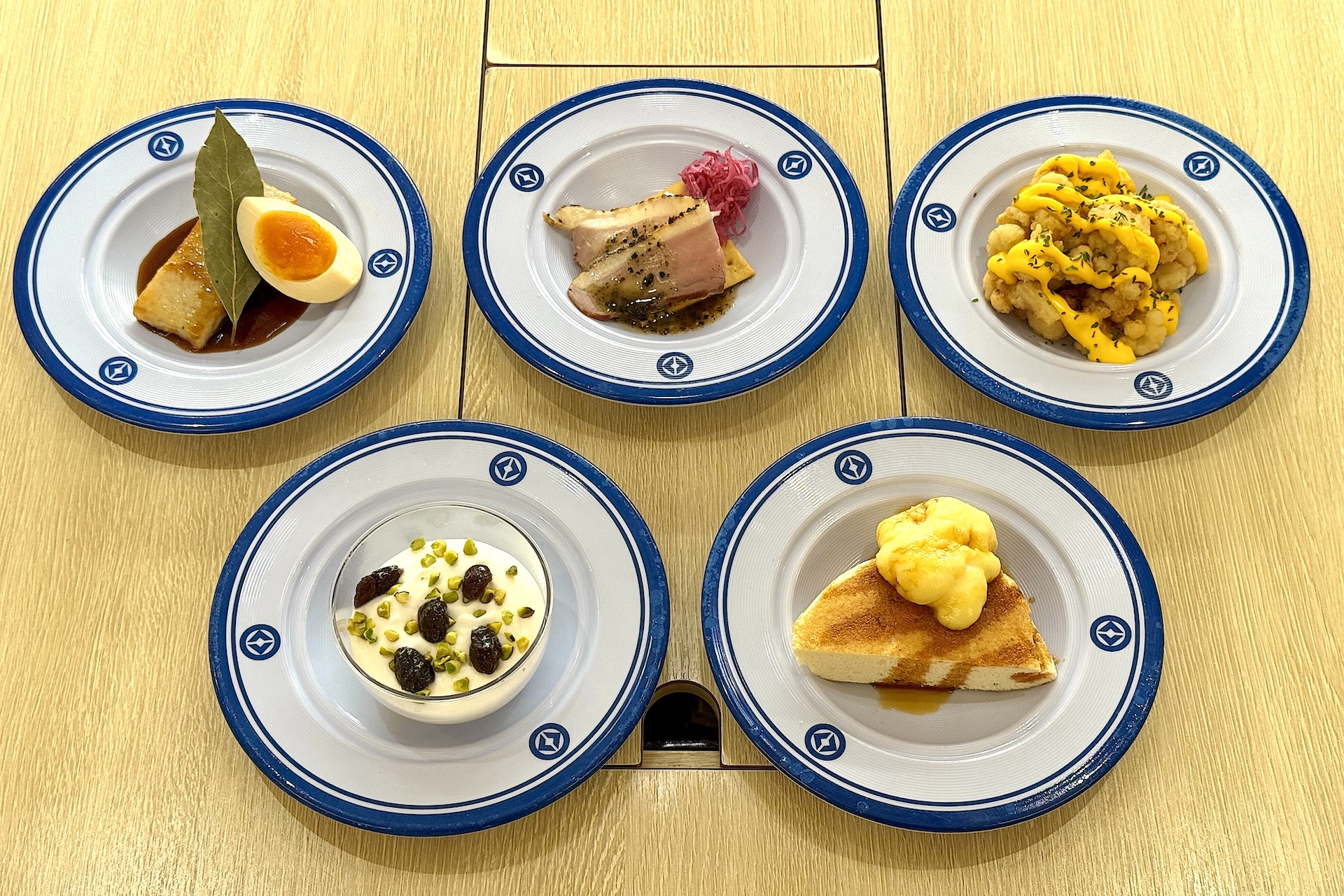 大阪・関西万博店で販売されていた「世界のグルメ」が気軽に楽しめる価格にアレンジされて登場。各115円