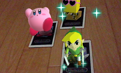 「キャラさつえい」を起動後に各種カードをカメラに映すと、おなじみのキャラクターたちが飛び出してくる