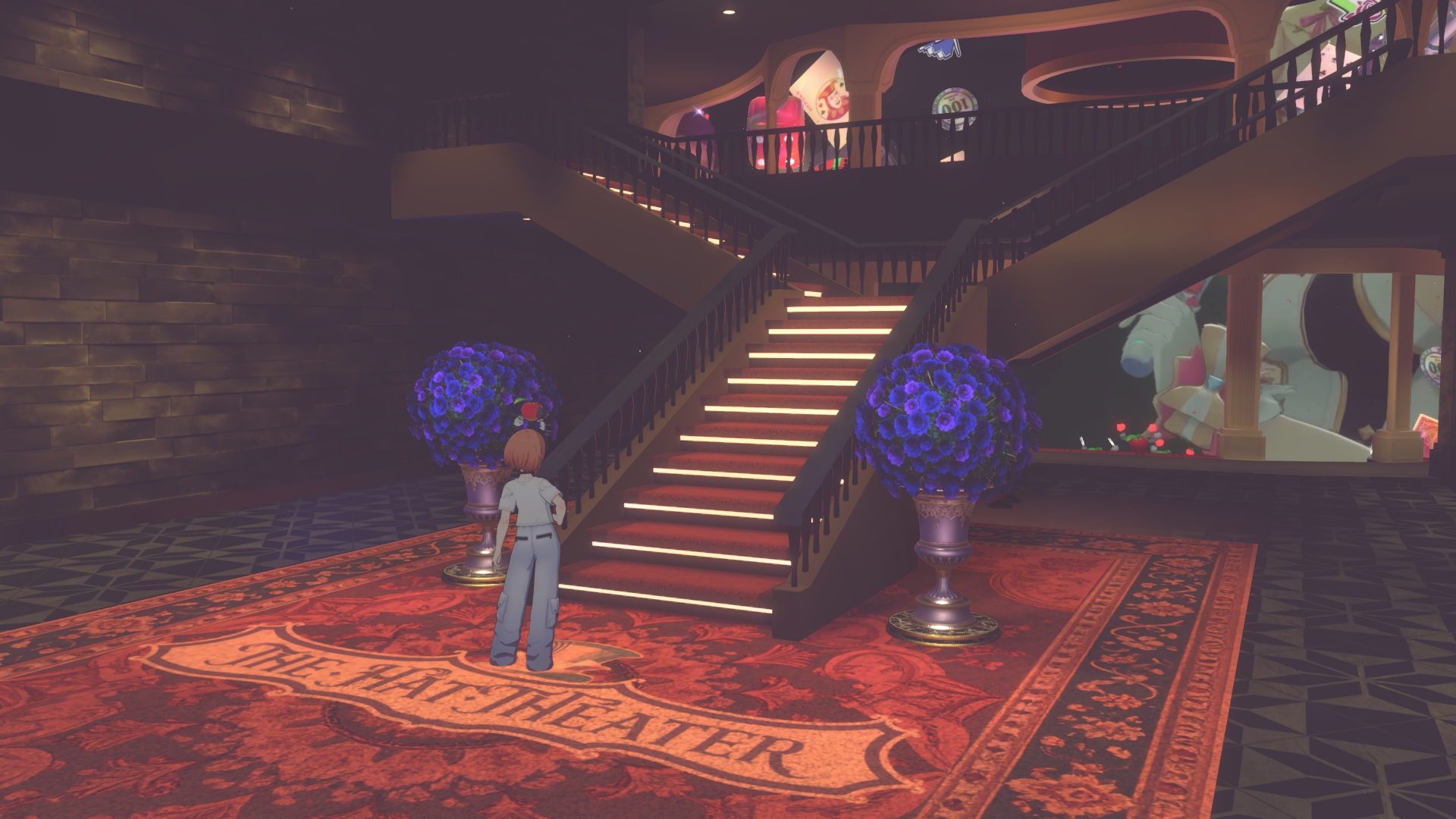 劇場は2階構成となっている。1階奥中央に薔薇の花びらが散りばめられたステージが位置しているが、その奥の特大ドーム型スクリーンの迫力もすごい