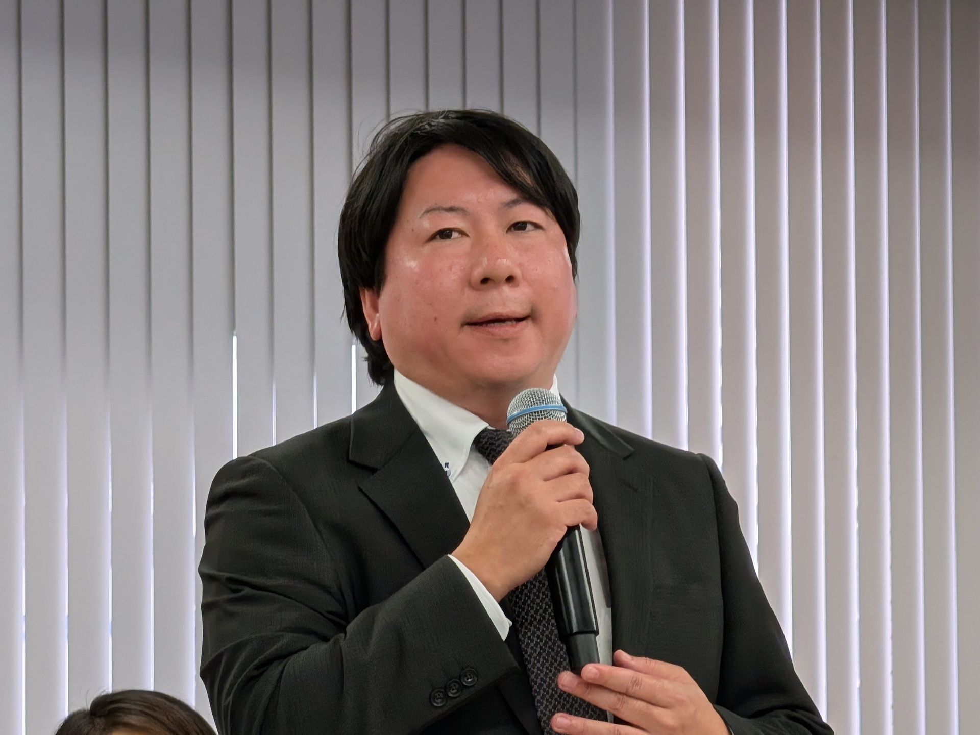 木村情報技術の経営戦略室兼イノベーション本部eスポーツユニットのゼネラルマネージャー、野津一徳氏、「自社のDXソリューションとeスポーツを掛け合わせ、多くの若者が挑戦できる場面をサポートする」