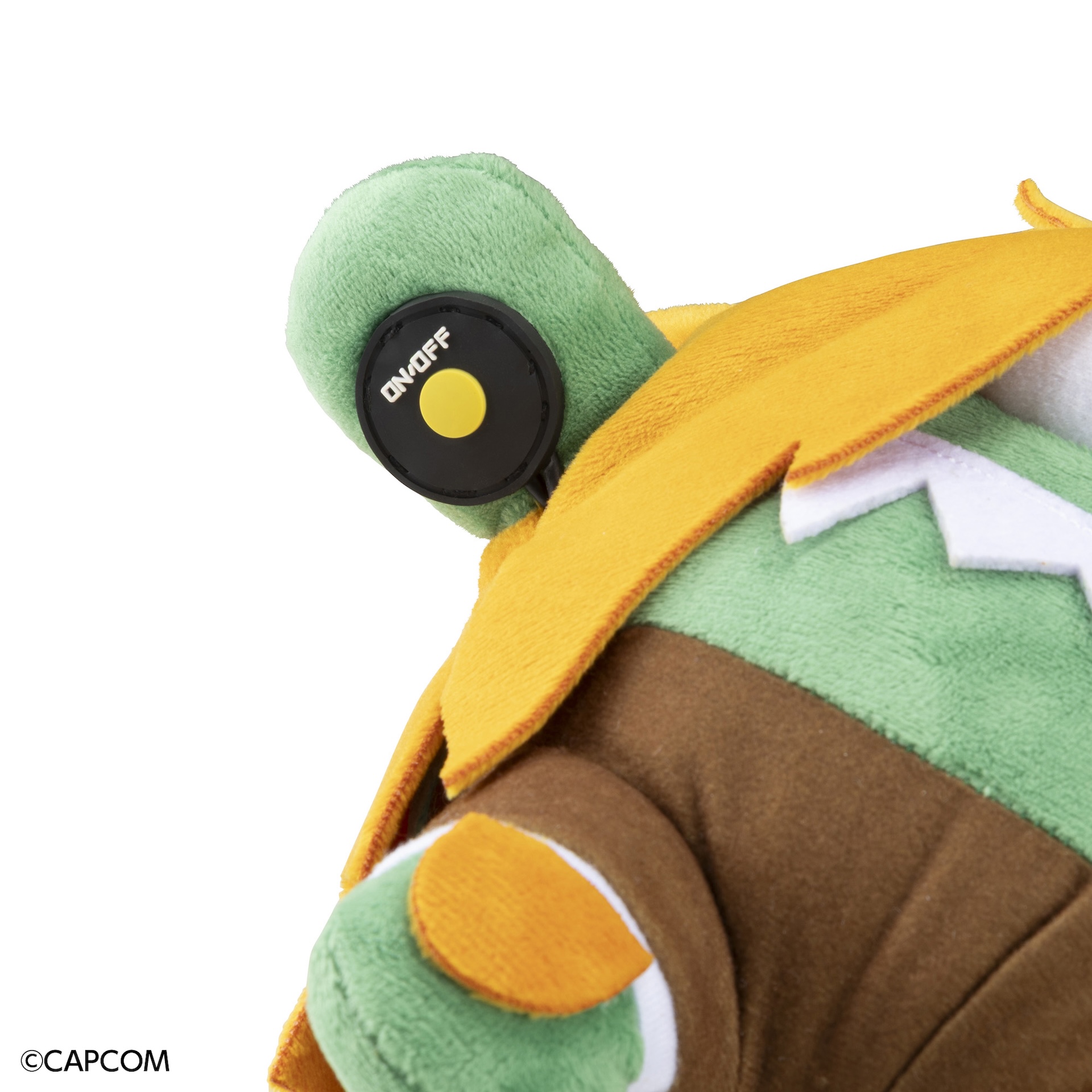 ブランカちゃん人形の右手にあるボタンを長押しすると、ブルブルと振動