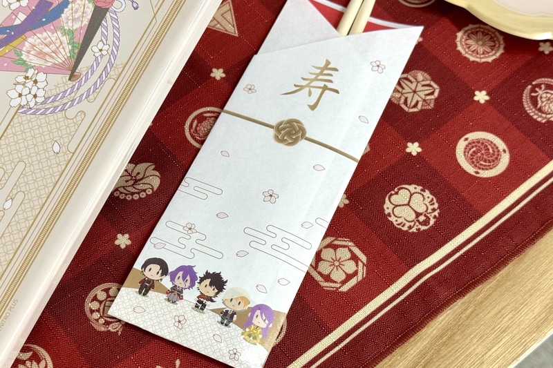 祝い箸の袋にはかわいいデフォルメキャラがデザインされている