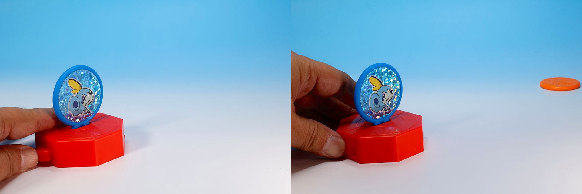 後方のボタンを指で押すと、ディスクが勢いよく飛び出す
