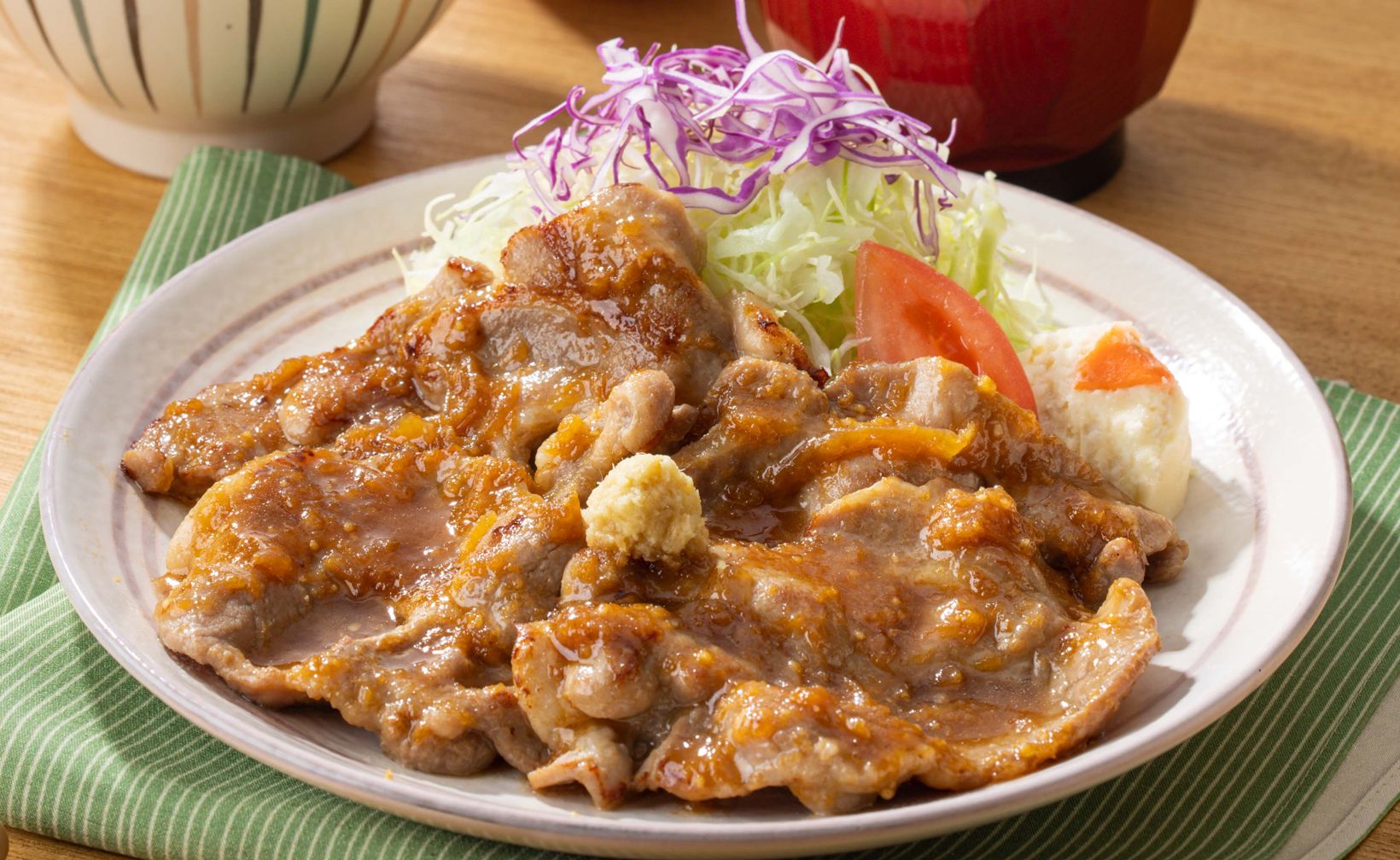 「豚肩ロースの生姜焼き」（定食1190円/単品1100円）