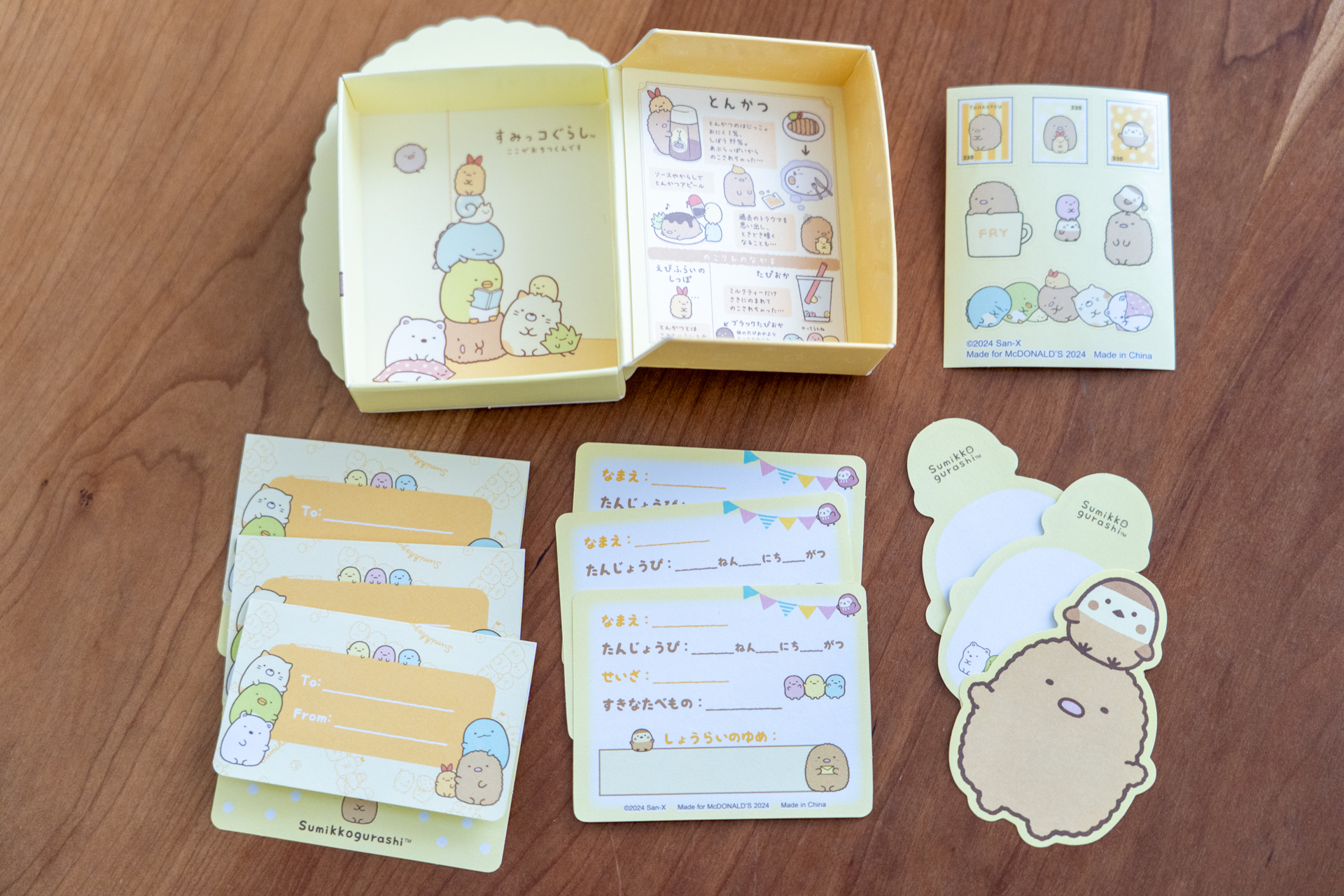 便箋には、とんかつをついばみにくるすずめがあたまに乗っている