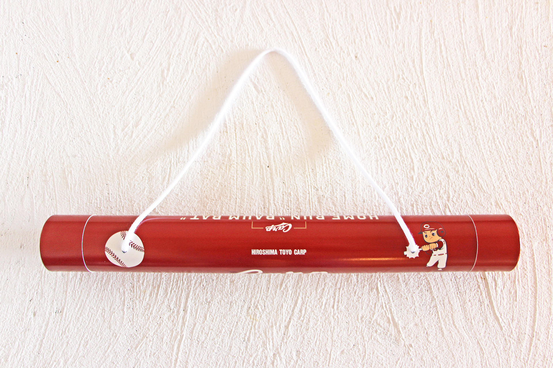 ボールをかっとばすカープ坊やをデザイン