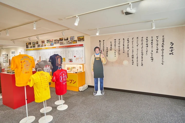 創業時の大倉社長・等身大パネルのフォトブース