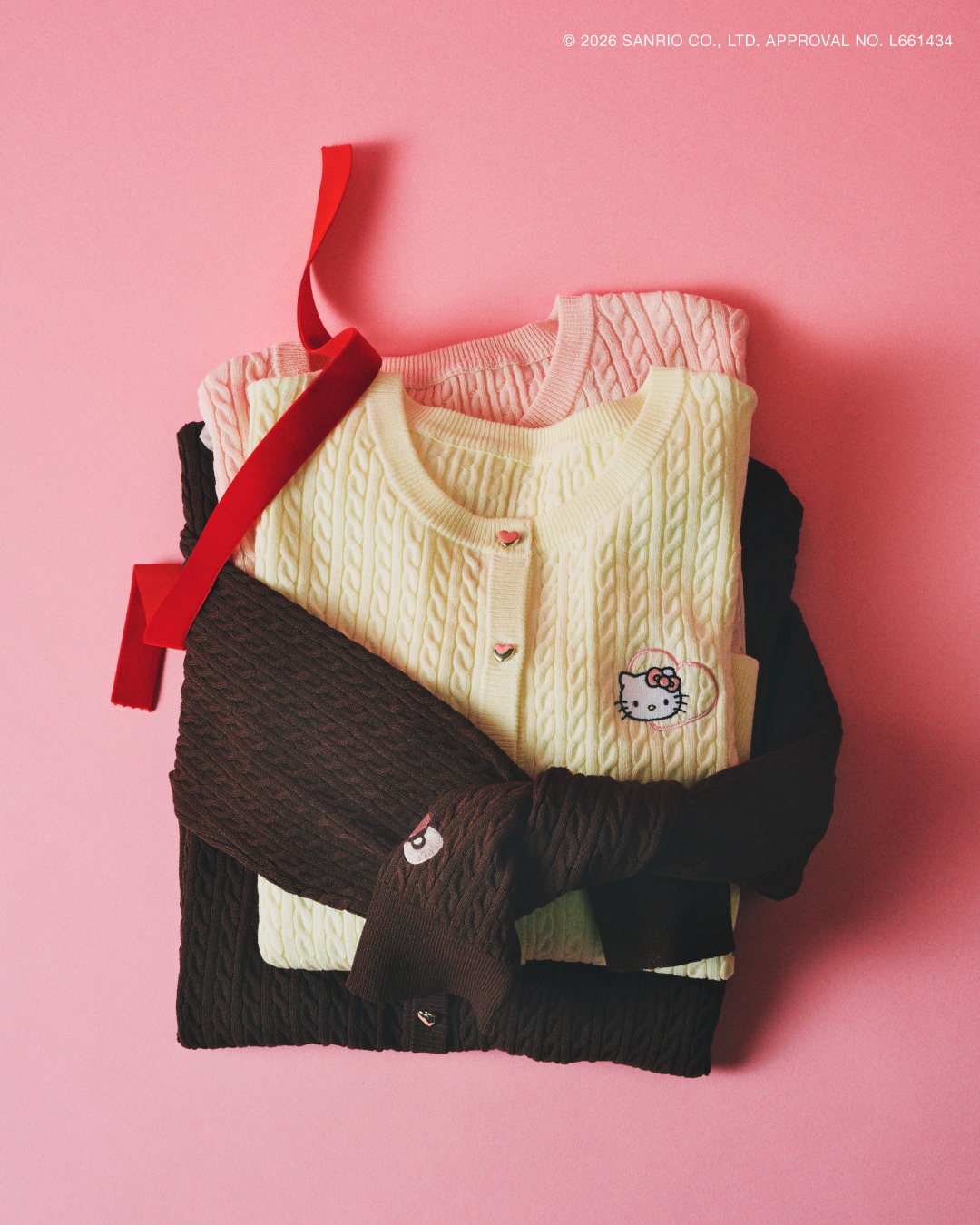 「ワッペンケーブルニットカーディガン」（5995円）