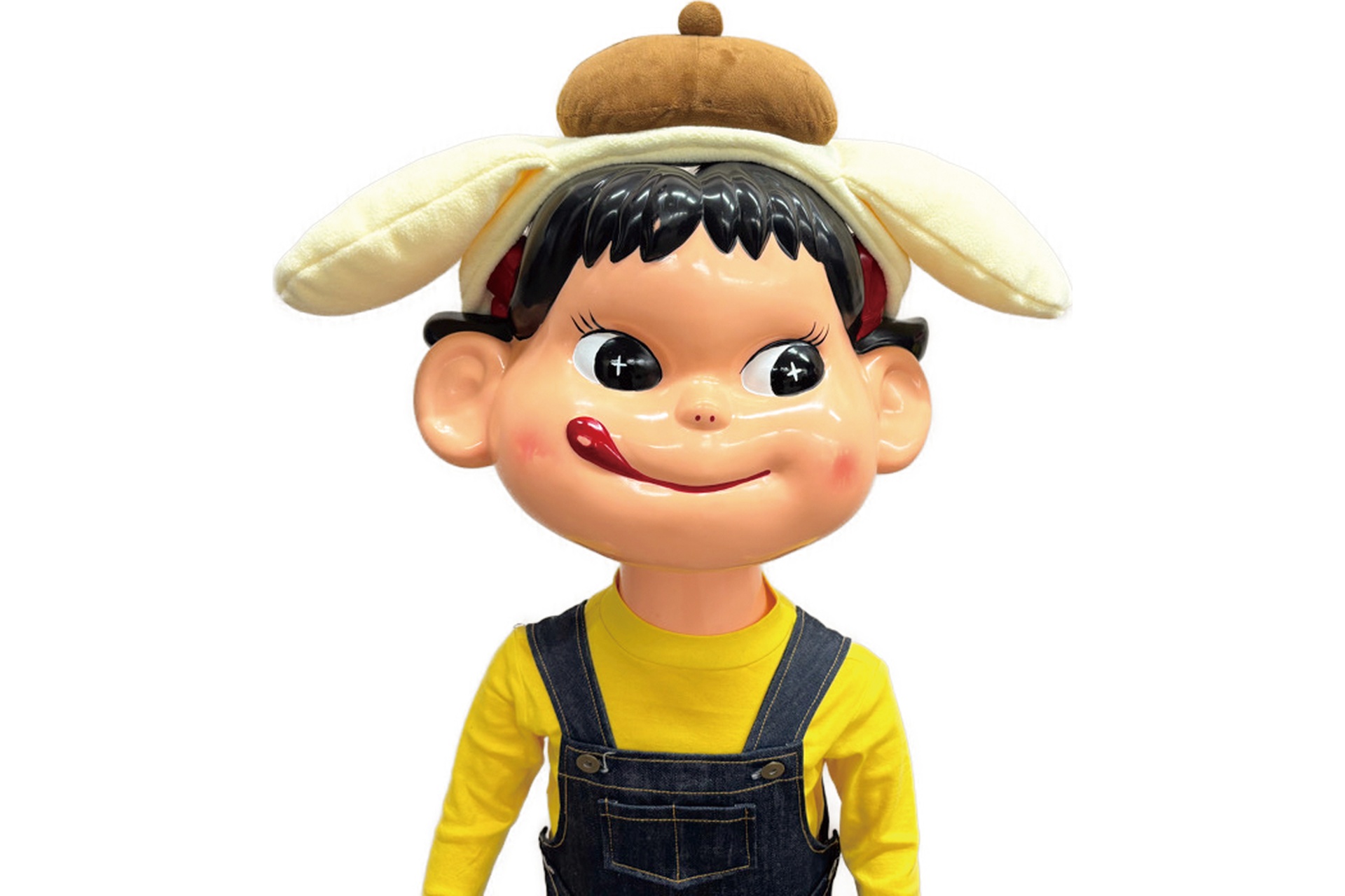 ポムポムプリン風カチューシャを着用するペコちゃん人形（イメージ）