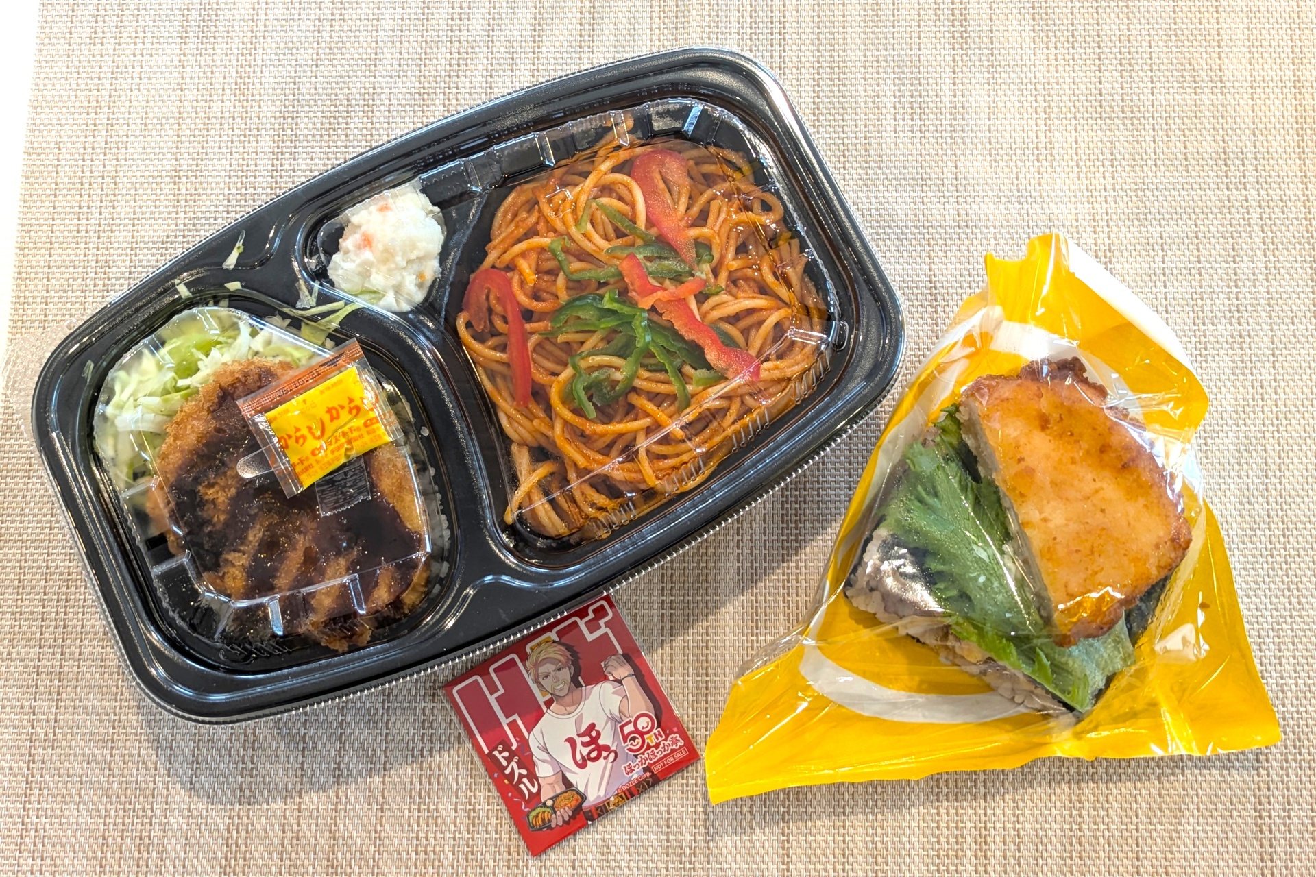 試食で提供された「チキンかつナポリタン弁当」と「ワンハンドBENTO」